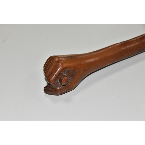 545 - A WOODEN SWAGGER STICK WITH CARVED CLENCHED FIST TERMINAL, approximate length 45cm (1)