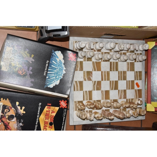 555 - TWO BOXES AND LOOSE OF JIGSAW PUZZLES AND GAMES, including marble effect chess set, Retro pin footba... 