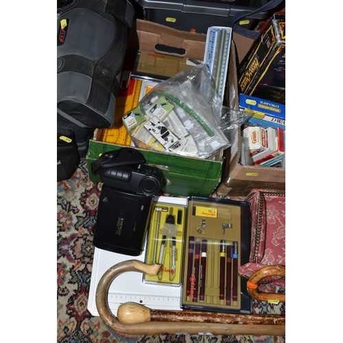 579 - SIX BOXES AND LOOSE OF BOOKS AND SUNDRY ITEMS, including  four walking canes, over thirty novelty pl... 