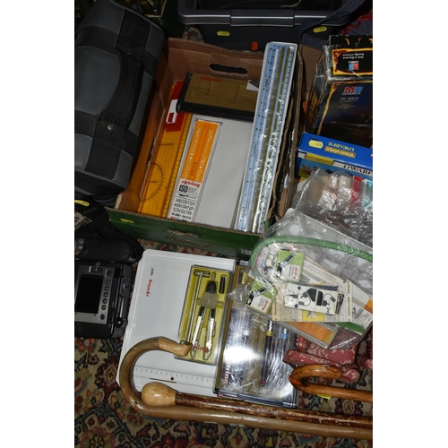 579 - SIX BOXES AND LOOSE OF BOOKS AND SUNDRY ITEMS, including  four walking canes, over thirty novelty pl... 