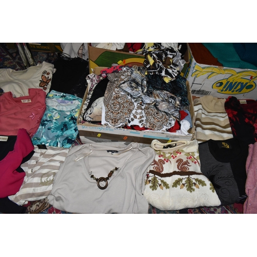 592 - SEVEN BOXES OF LADIES CLOTHING AND HANDBAGS, to include overcoats, jackets, sweaters, dresses and sk... 