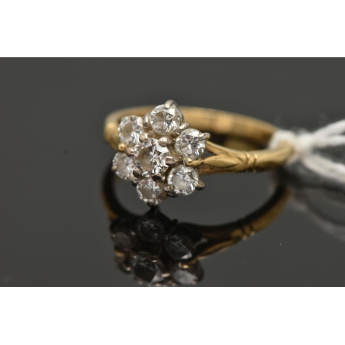 142 - AN 18CT GOLD DIAMOND CLUSTER RING, designed as a cluster of brilliant cut diamonds in claw settings,... 