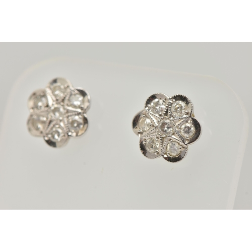 143 - A PAIR OF DIAMOND CLUSTER STUD EARRINGS, each designed as a floral cluster of brilliant cut diamonds... 