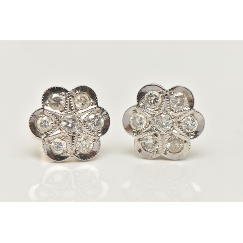 143 - A PAIR OF DIAMOND CLUSTER STUD EARRINGS, each designed as a floral cluster of brilliant cut diamonds... 