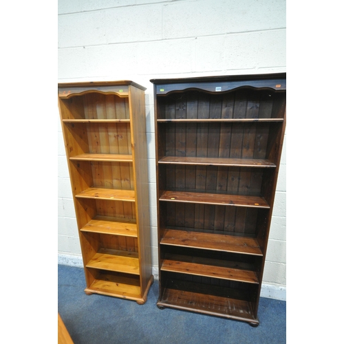 1373 - THREE PINE OPEN BOOKCASES, with an arrangement of shelving, stained bookcase width 86cm x depth 34cm... 