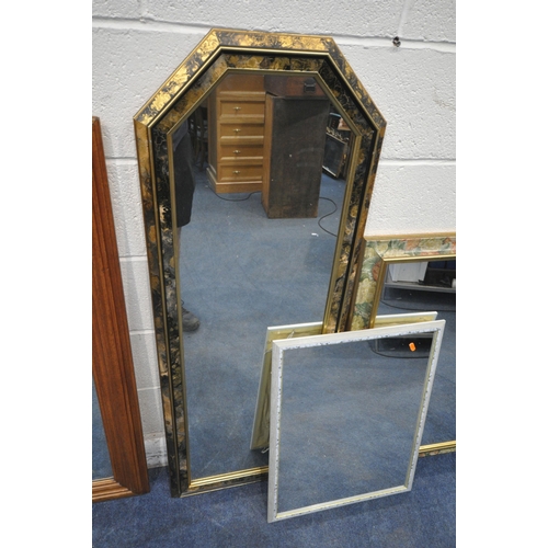 1374 - AN OAK FRAMED WALL MIRROR, with flamboyant decoration to pane, 118cm x 81cm, a black and gilt framed... 