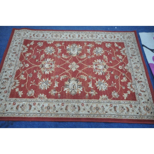 1382 - A MODERN PATTERNED RUG, 190cm x 135cm, and a floral rug (condition report: in need of cleaning) (2)