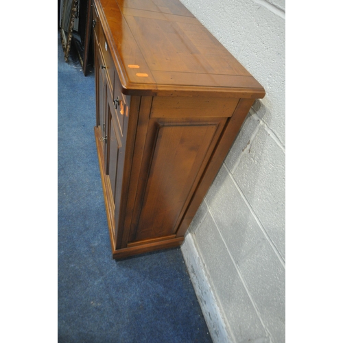 1383 - A MODERN CHERRYWOOD CABINET, with a hidden revolving pen tidy, three drawers and double cupboard doo... 