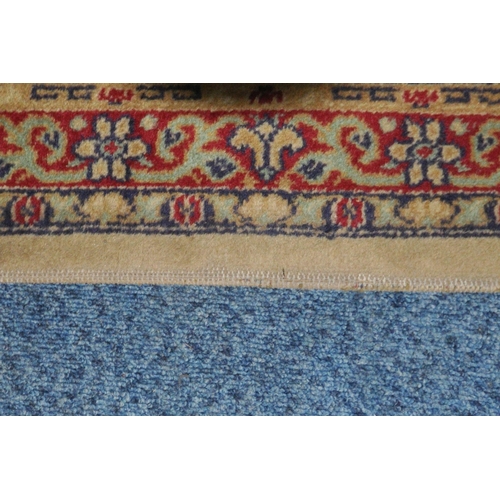 1386 - A MACHINE WOVEN PATTERNED RUG, with a central medallion and multi strap border, 320cm x 229cm (condi... 