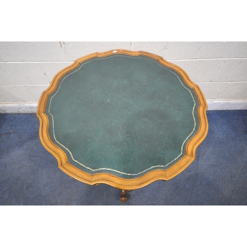 1393 - A REPRODUCTION MAHOGANY TRIPOD TABLE, with a wavy top, green leather inlay, and single drawer, diame... 