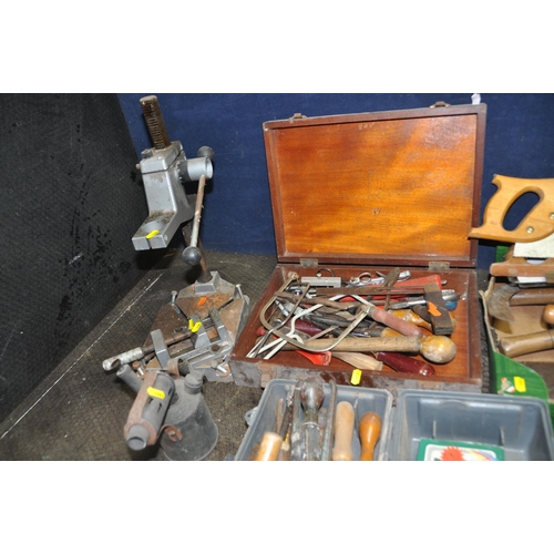 A COLLECTION OF CARPENTRY TOOLS including saws, chisels, an auger bit ...