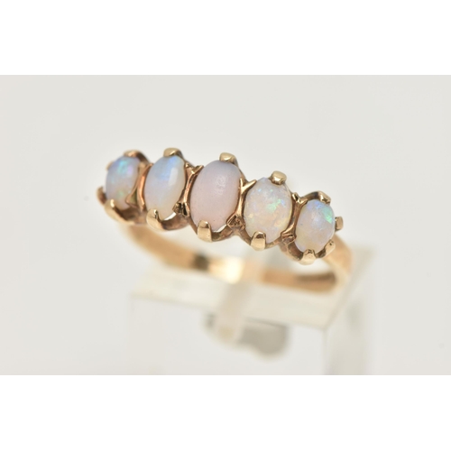 1 - A 9CT GOLD OPAL RING, designed with a row of five oval cut opal cabochons, each in a two claw settin... 