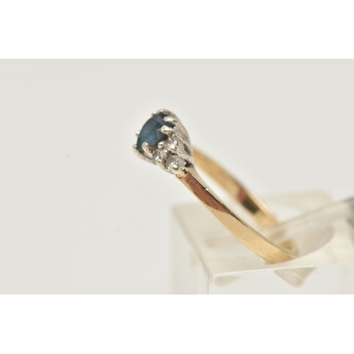 11 - A 9CT GOLD BLUE SPINEL AND DIAMOND RING, set with a central heart cut blue spinel in a three claw se... 