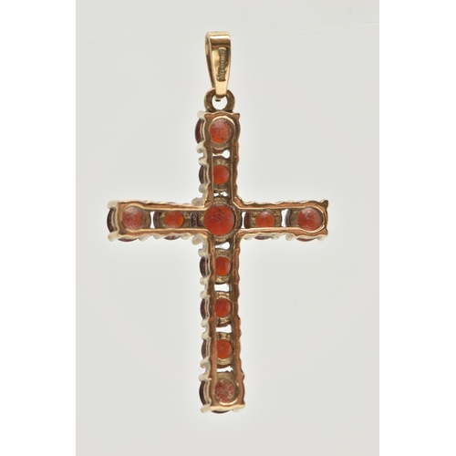 12 - A 9CT GOLD GARNET SET CROSS PENDANT, set with circular cut garnets, fitted with a tapered bail, hall... 