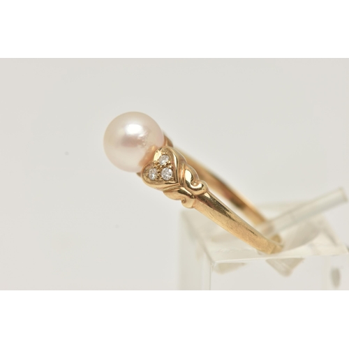 17 - A 9CT GOLD CULTURED PEARL AND DIAMOND RING, set with a single cultured white pearl, measuring approx... 