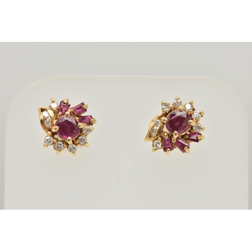 18 - A PAIR OF YELLOW METAL RUBY AND DIAMOND EARRINGS, each designed as a cluster set with a central circ... 