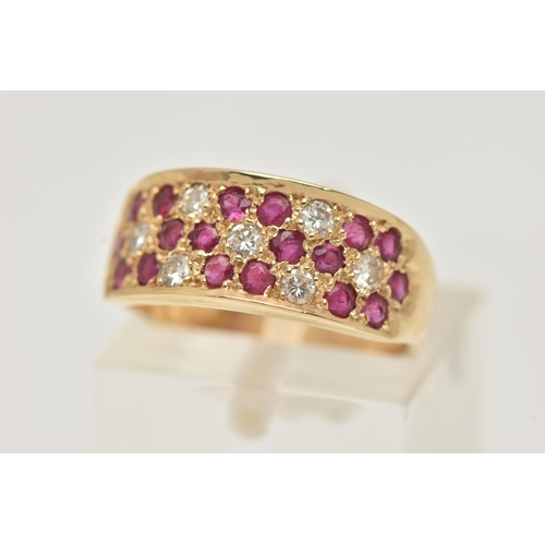 3 - A 14CT YELLOW GOLD RUBY AND DIAMOND SET RING, pave set with circular cut rubies and brilliant cut di... 