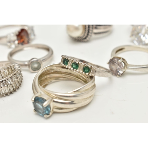 30 - AN ASSORTMENT OF RINGS, to include a white gold and topaz ring, hallmarked 9ct Birmingham, ring size... 