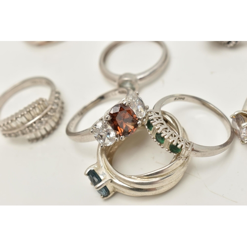 30 - AN ASSORTMENT OF RINGS, to include a white gold and topaz ring, hallmarked 9ct Birmingham, ring size... 