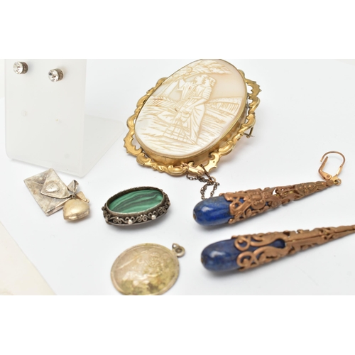 48 - A SMALL BAG OF JEWELLERY, to include a large carved cameo brooch, in a gilt metal mount, fitted with... 