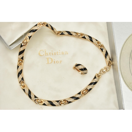 60 - A THREE PIECE 'CHRISTIAN DIOR' SET, to include a necklace, bracelet and clip on earrings, gold plate... 