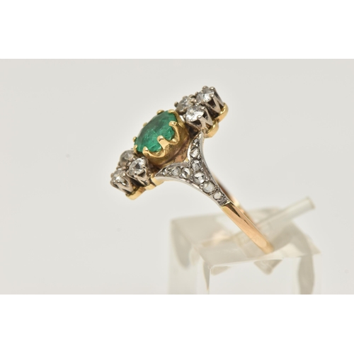 63 - AN 18CT GOLD EMERALD AND DIAMOND DRESS RING, centrally set with an oval cut emerald in an eight claw... 