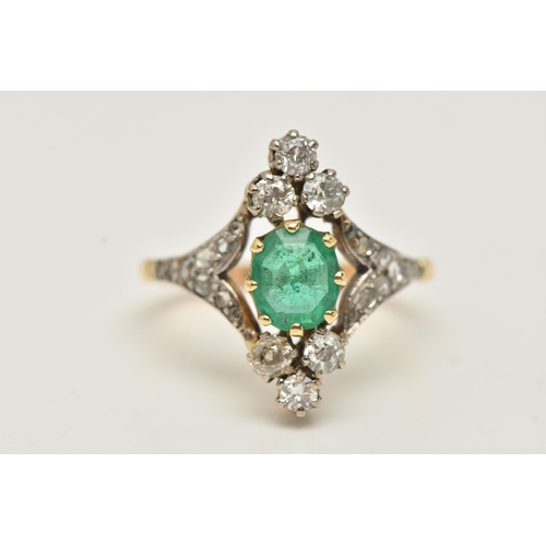 63 - AN 18CT GOLD EMERALD AND DIAMOND DRESS RING, centrally set with an oval cut emerald in an eight claw... 