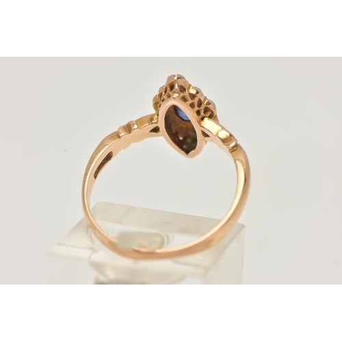 9 - AN EARLY 20TH CENTURY SAPPHIRE AND SPLIT PEARL, 15CT GOLD RING, of a marquise form set with a centra... 