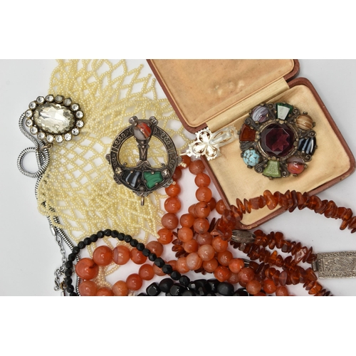 102 - A BAG OF ASSORTED COSTUME JEWELLERY, to include a carnelian bead necklace fitted with a white metal ... 