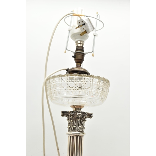 196 - A LATE 19TH/EARLY 20TH CENTURY OIL LAMP, the hobnail and facet cut clear glass reservoir fitted to t... 