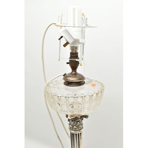 196 - A LATE 19TH/EARLY 20TH CENTURY OIL LAMP, the hobnail and facet cut clear glass reservoir fitted to t... 