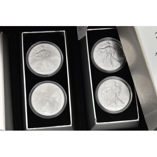 197 - A CASED DISPLAY OF USA SILVER DOLLAR COINS, to include Eagle Silver dollar coins  in individual boxe... 