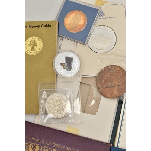 202 - A NIKE BOX CONTAINING COINS COMMEMORATIVES, to include a George VI 1937 Proof Crown, a French 50mm B... 