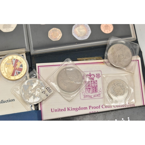 202 - A NIKE BOX CONTAINING COINS COMMEMORATIVES, to include a George VI 1937 Proof Crown, a French 50mm B... 