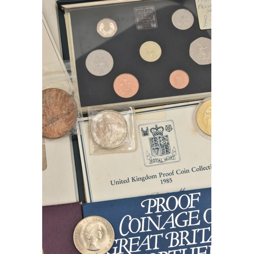 202 - A NIKE BOX CONTAINING COINS COMMEMORATIVES, to include a George VI 1937 Proof Crown, a French 50mm B... 