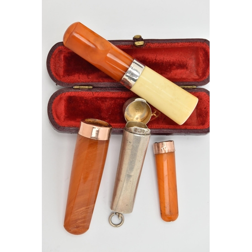 75 - THREE LATE VICTORIAN AND EDWARDIAN AMBER CHEROOT HOLDERS, two with 9ct collars, one with central sil... 