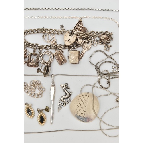 76 - A SELECTION OF SILVER AND WHITE METAL JEWELLERY, to include a charm bracelet suspending eleven charm... 