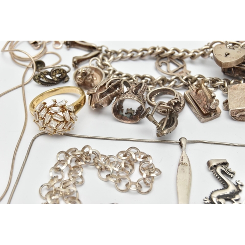 76 - A SELECTION OF SILVER AND WHITE METAL JEWELLERY, to include a charm bracelet suspending eleven charm... 