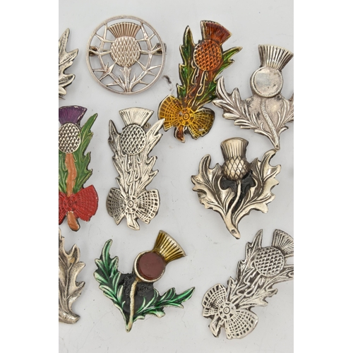 80 - A SELECTION OF MAINLY SCOTTISH RELATED JEWELLERY, to include various thistle brooches, some with ena... 