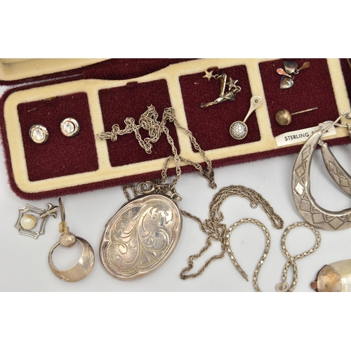 83 - A SELECTION OF SILVER AND WHITE METAL JEWELLERY, to include a hinged bangle, a heart shape locket, a... 