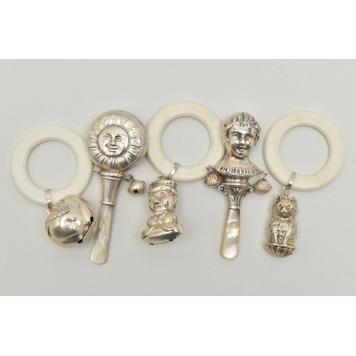 118 - FIVE SILVER BABY RATTLES, to include a silver apple rattle, hallmarked 'Quarrier Ward Ltd' Birmingha... 