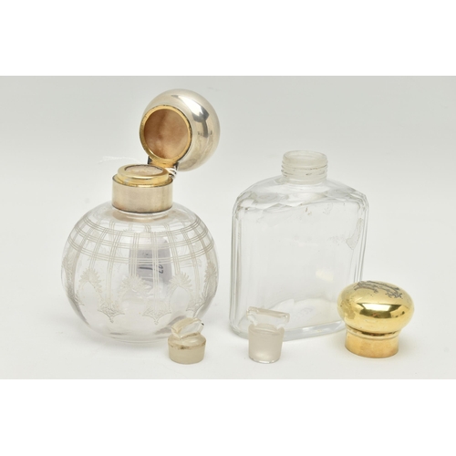 128 - TWO SCENT BOTTLES, the first an etched glass round scent bottle fitted with a silver hinged cover wi... 