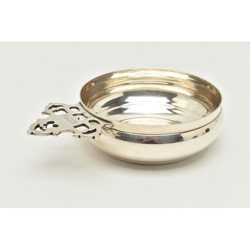 132 - A GEORGE V SILVER PORRINGER, the pierced handle engraved with initials 'AJJW', makers C Shapland & C... 