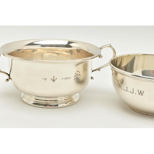 133 - A GEORGE V SILVER TWIN HANDLED PORRIDGE BOWL AND ANOTHER GEORGE V SILVER PORRIDGE BOWL WITHOUT HANDL... 