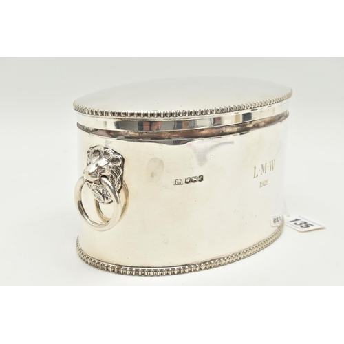 135 - A GEORGE V SILVER BISCUIT/CRACKER BARREL OF OVAL FORM WITH LION MASK RING HANDLES, cast rims, the fr... 