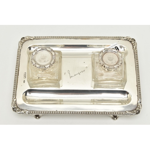 139 - A LATE VICTORIAN SILVER INKSTAND OF RECTANGULAR FORM, foliate scroll and shell cast corners, reeded ... 