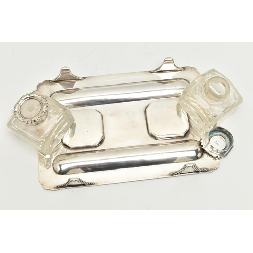 139 - A LATE VICTORIAN SILVER INKSTAND OF RECTANGULAR FORM, foliate scroll and shell cast corners, reeded ... 