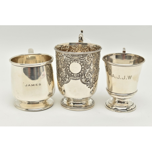 141 - THREE VICTORIAN/20TH CENTURY SILVER CHRISTENING MUGS, comprising a Victorian example with beaded rim... 