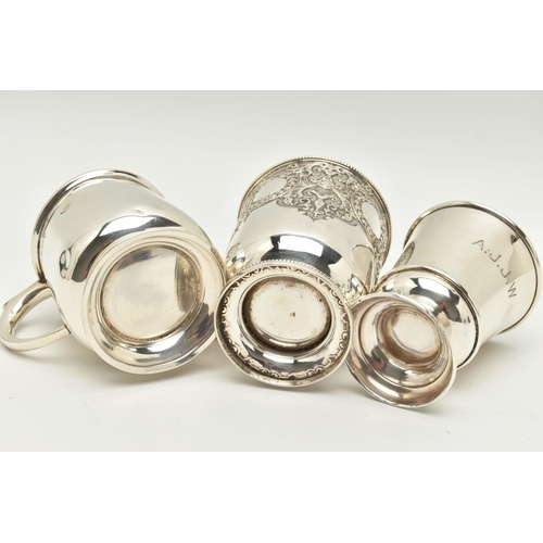 141 - THREE VICTORIAN/20TH CENTURY SILVER CHRISTENING MUGS, comprising a Victorian example with beaded rim... 