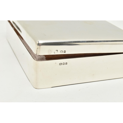 143 - A GEORGE V SILVER CIGARETTE BOX OF RECTANGULAR FORM, engraved monogram to the hinged lid, cedarwood ... 